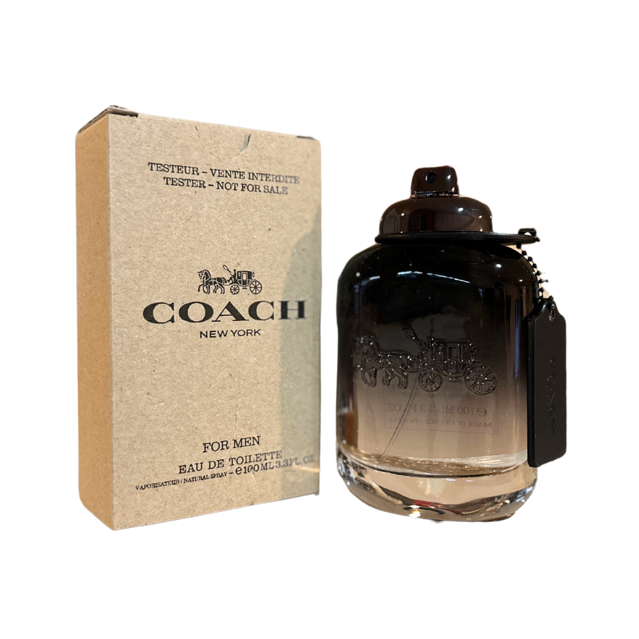 A Coach for Men Eau de Toilette spray bottle with a black cap and a label that reads 'Coach' and 'New York'. The bottle is shown in front of its cardboard packaging, which has similar branding and text.