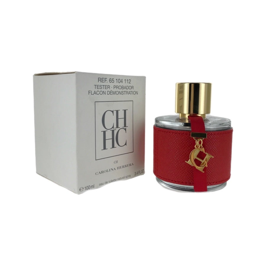A bottle of CH Carolina Herrera EDT with a red label and gold-colored cap, alongside its white box packaging labeled 'Ref. 5101'.