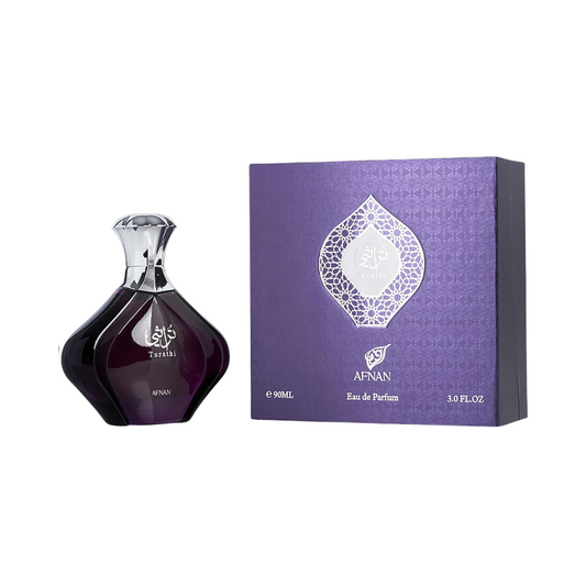 A purple bottle of Afnan Turathi Purple EDP alongside its packaging box with a decorative element on the top.