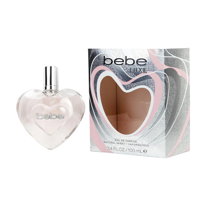 A bottle of Bebe Luxe EDP with a heart-shaped label and a box with the brand name and scent details.