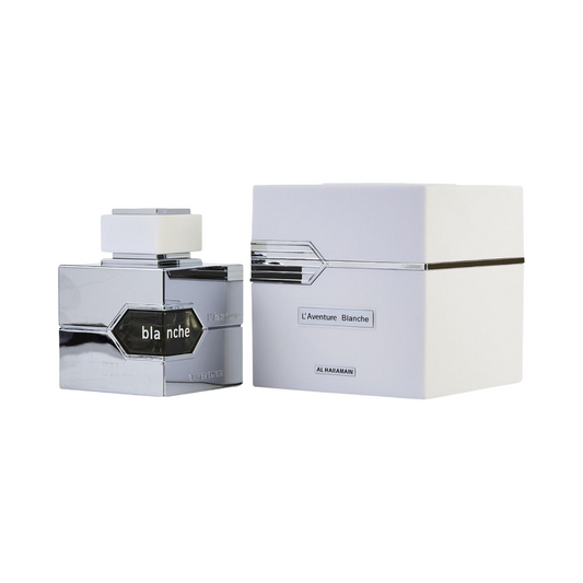 A bottle of Al Haramain L'Aventure Blanche EDP next to its white box packaging, with the brand name and product name visible on the items.