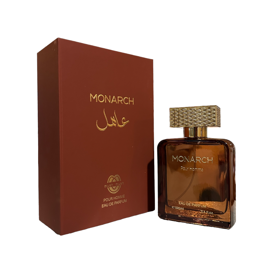 A brown perfume bottle with a gold-colored cap, alongside its original packaging box, both featuring the 'MONARCH' brand name.