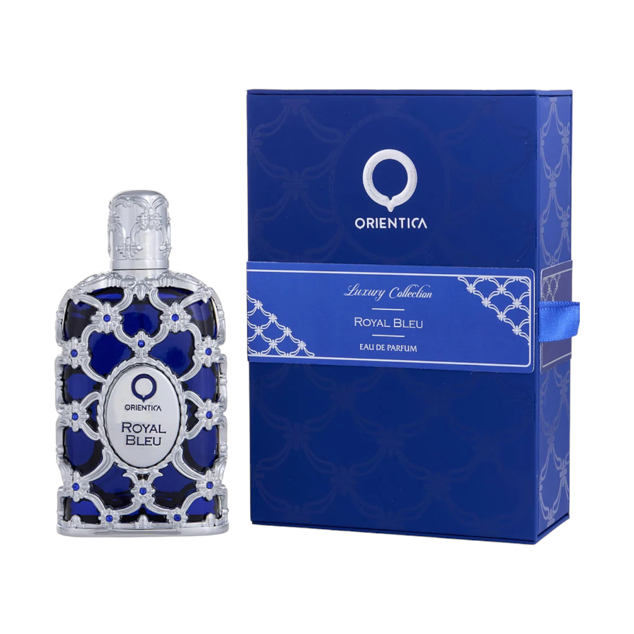 A bottle of Orientica Royal Bleu EDP next to its blue packaging box with gold and white patterns.