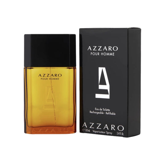 Azzaro Pour Homme Eau de Toilette Spray in a clear glass bottle with a black cap, alongside its black packaging box with the brand name and product title written in white.