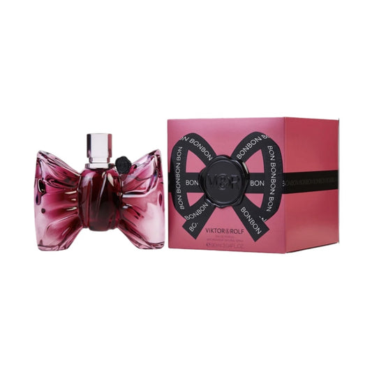 A pink bottle of Viktor & Rolf Bonbon EDP with a bow-shaped design, accompanied by a pink box with the product name and brand visible.