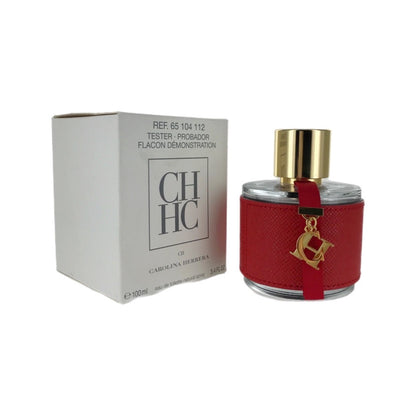 A bottle of CH Carolina Herrera EDT with a red label and gold-colored cap, alongside its white box packaging labeled 'Ref. 5101'.