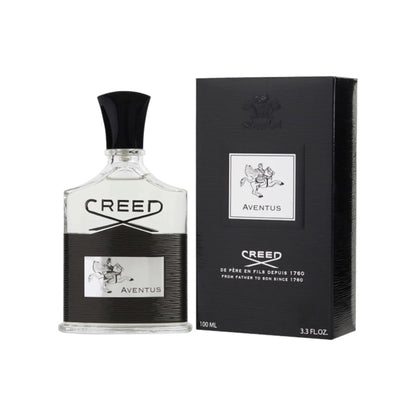 A bottle of Creed Aventus eau de parfum for men alongside its black box packaging, both featuring the Creed logo and design elements in silver and white.