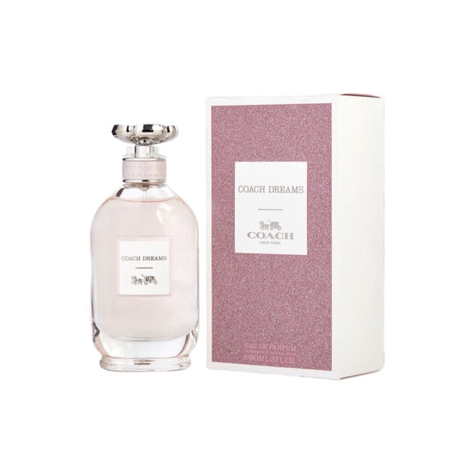 A bottle of Coach Dreams eau de parfum spray for women, with a capacity of 3.0oz, alongside its packaging box.