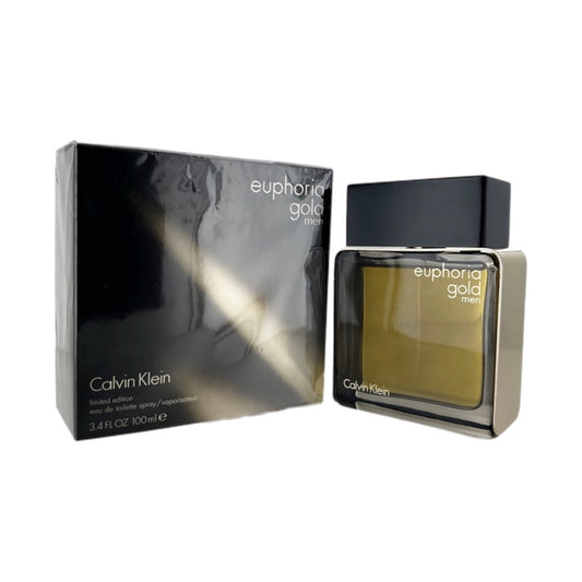 A bottle of Euphoria Gold EDT for men by Calvin Klein, with the packaging box beside it. The bottle is gold-colored with a black label and the box is black with 'Euphoria Gold' text on it.