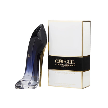 A bottle of Carolina Herrera Good Girl Legere EDP with a high heel shoe next to it, and a white box with gold accents labeled 'GOOD GIRL LEGERE'.
