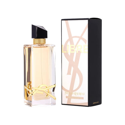 YSL Libre EDT in a black bottle with gold accents next to its black box packaging with gold accents and YSL logo.